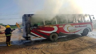 Bus and truck set on fire in Ctg