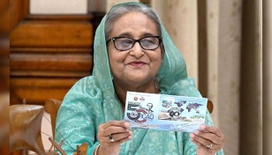 PM releases postage stamps on Smart Bangladesh