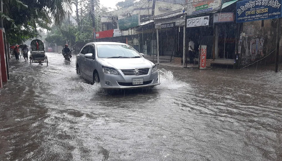 Barishal city residents wade in knee-deep water