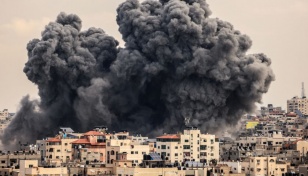 Israel battles Hamas, masses near Gaza after attack like 9/11