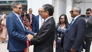 President reaches Singapore from Indonesia