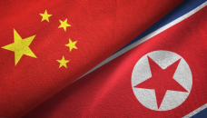 China seeks deeper ties with N Korea as Kim arrives in Russia