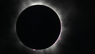 Total solar eclipse sweeps across North America