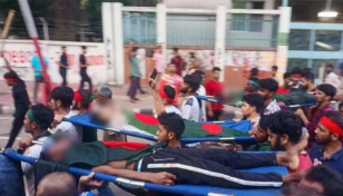 Amid gunshots, procession with dead bodies held in Dhaka