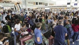 Tokyo cancels flights, trains as strong typhoon swerves nearby