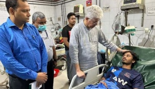 Adilur visits injured students at DMCH