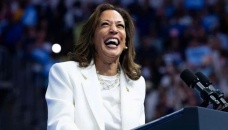 Harris says in first interview US ready to turn page on Trump