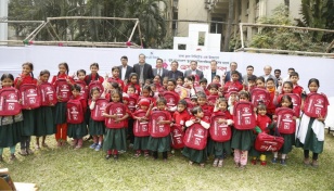 Dhaka Club donates school supplies to underprivileged children