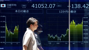 Asian markets down as traders eye US jobs report