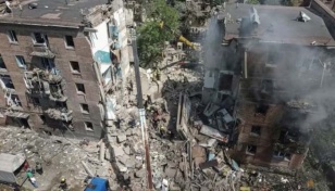Kyiv mourns as rescuers clear rubble from children's hospital