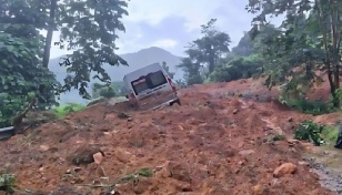 7 dead in Vietnam after landslide buries van
