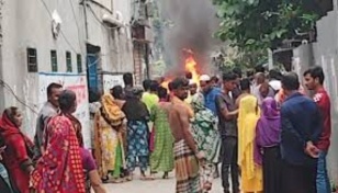 BGB vehicle set on fire at Hatirjheel