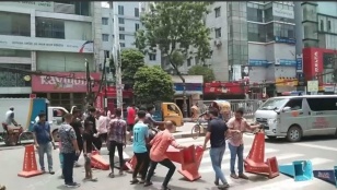Protestors, police clash in Uttara: Police box, 2 buses vandalised