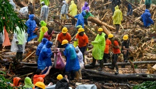 India landslide toll hits 151 as rain hampers rescue work