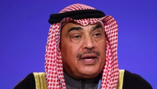 Kuwait emir names former PM as new crown prince