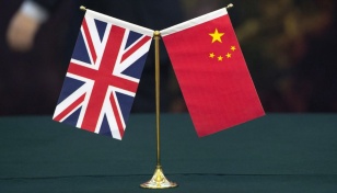 China says MI6 recruited state workers to spy for UK