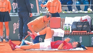 Djokovic out of French Open with knee injury