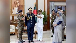 New air chief Hasan Mahmood Khan adorned with rank badge