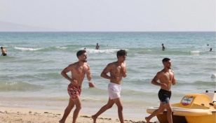 In shadow of war, Lebanese find respite on southern beach