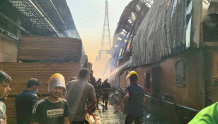 Munshiganj factory rages on, 7 injured