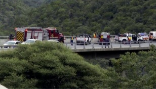 Bus plunges off S Africa bridge killing 45