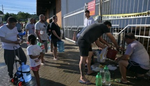 Brazilians queue for water as flood damage intensifies