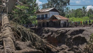 Cold lava sweeps Sumatra villages, killing 37