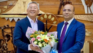 Donald Lu arrives in Dhaka