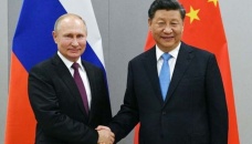 Xi Jinping commits to strengthening ties in meeting with Putin