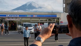 Sick of tourists, Japan town to block Mount Fuji view