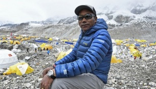 Nepali reaches summit of Everest for record 30th time