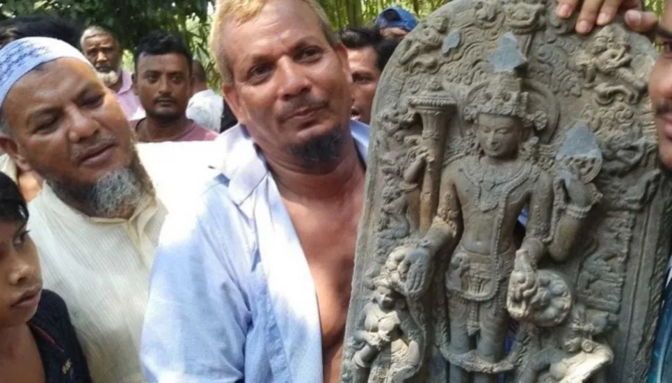 Statue made of touchstone recovered from Thakurgaon
