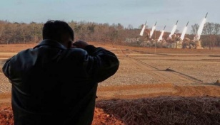 N Korea's Kim supervises rocket launcher test