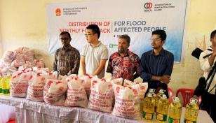 Chinese Embassy distributed Relief to 12,500 people in Feni 