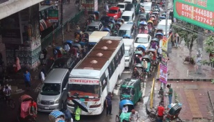 Early morning rain causes traffic chaos in Dhaka