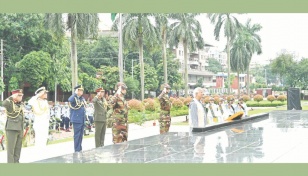 Yunus pays tribute to armed forces martyrs at Shikha Anirban