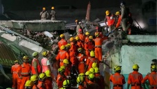 Indian rescuers pull 8 dead from collapsed building