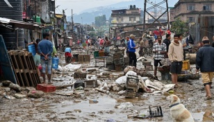 Nepal surveys flood wreckage as death toll reaches 192