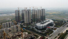 China's debt-ridden Evergrande resumes work on more than 10 property projects 