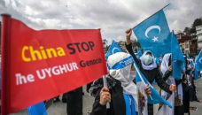 West sanctions China over Uighur abuses, Beijing hits back at EU