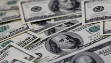 Dollar marooned as investors shrug off inflation spike