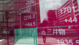 Asian markets mixed as traders weigh lockdowns, stimulus