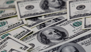 Dollar moves toward year's highs ahead of inflation test