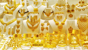 Gold prices down by Tk 1,166 per bhori 