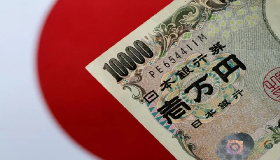 Japan household spending rises as GDP revised up